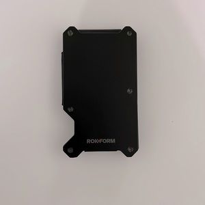 Rokform Aluminum Magnetic Wallet with RFID Blocking. Brand new, never used.